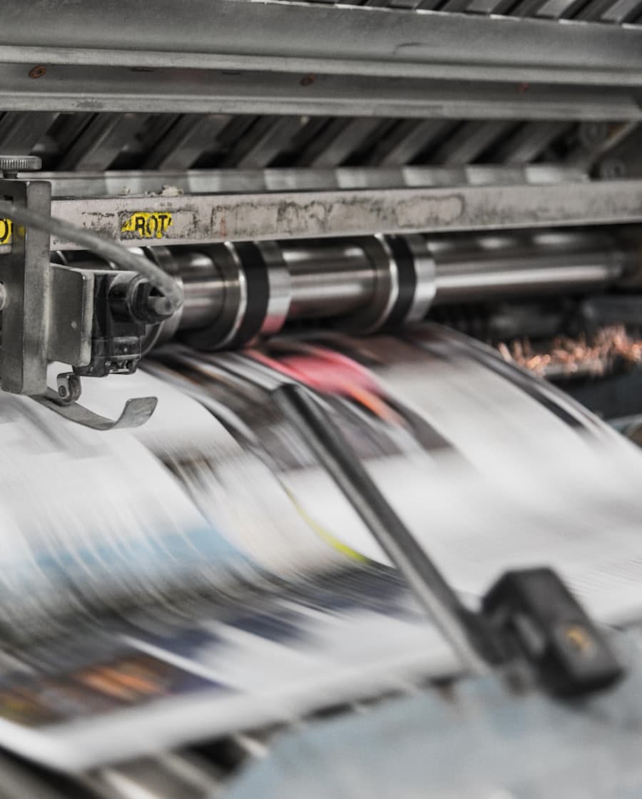 A printing press running a sheet
